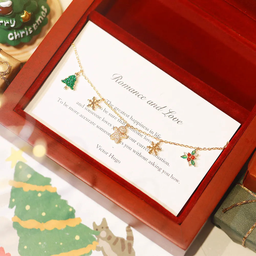 Christmas Charm Bracelet in 925 Sterling Silver with Christmas Tree and Gingerbread Man Motifs