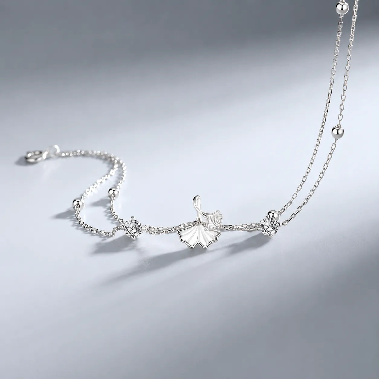 Ginkgo Leaf Bracelet in 925 Sterling Silver with Two Cubic Zirconia Accents and Five Silver Beads