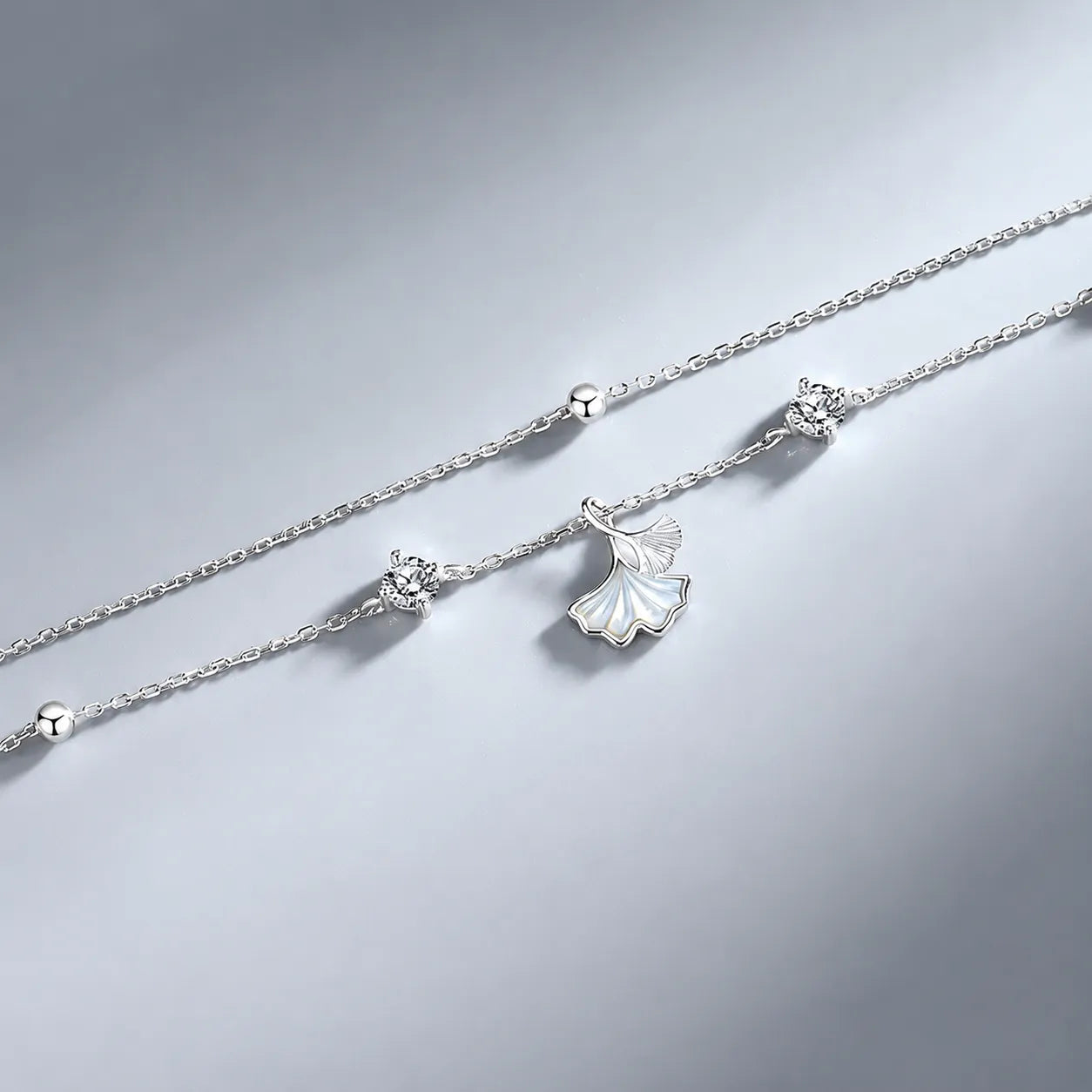 Ginkgo Leaf Bracelet in 925 Sterling Silver with Two Cubic Zirconia Accents and Five Silver Beads