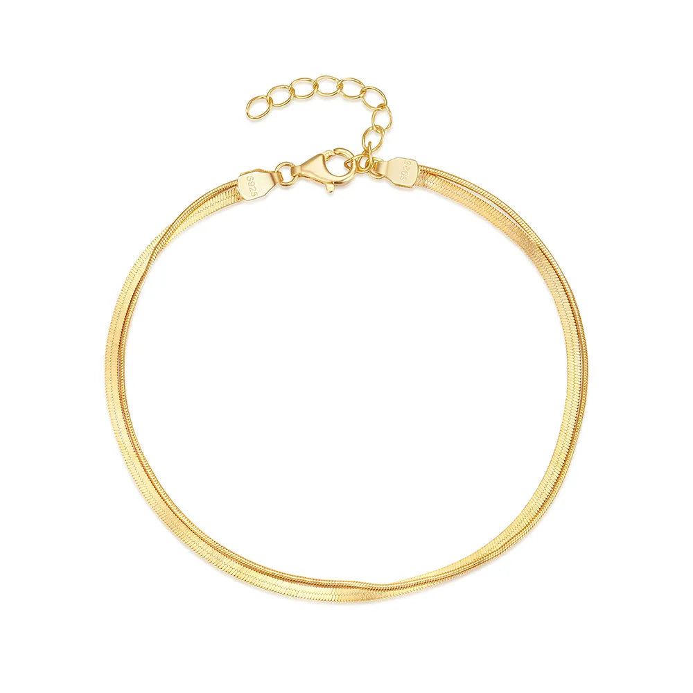 Gold double snake chain bracelet in a full product view on a white background