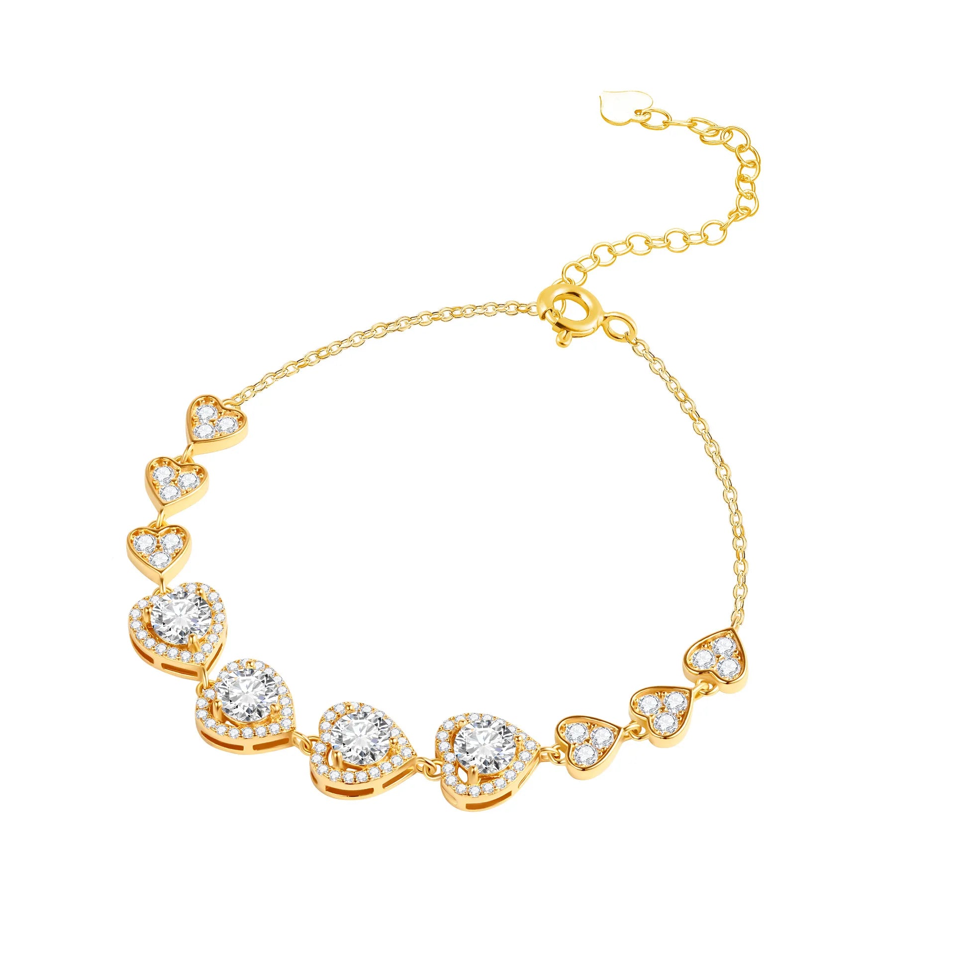 Gold-tone heart link bracelet on white, with four larger center hearts and three smaller hearts on each side