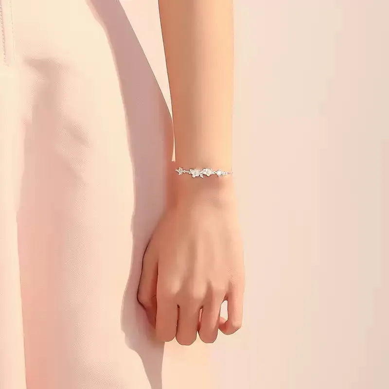 Jasmine Flower Bracelet in 925 Sterling Silver with a Branch Centerpiece and Two Cubic Zirconia Stones