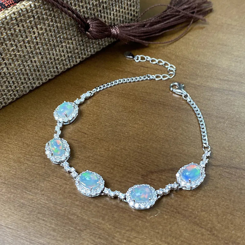 Opal Birthstone Bracelet in 925 Sterling Silver with Five Oval Opal Halo Links