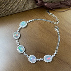 Opal Birthstone Bracelet in 925 Sterling Silver with Five Oval Opal Halo Links