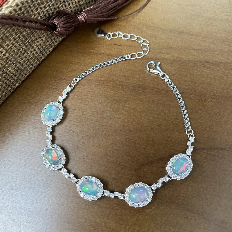 Opal Birthstone Bracelet in 925 Sterling Silver with Five Oval Opal Halo Links