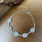 Opal Birthstone Bracelet in 925 Sterling Silver with Five Oval Opal Halo Links
