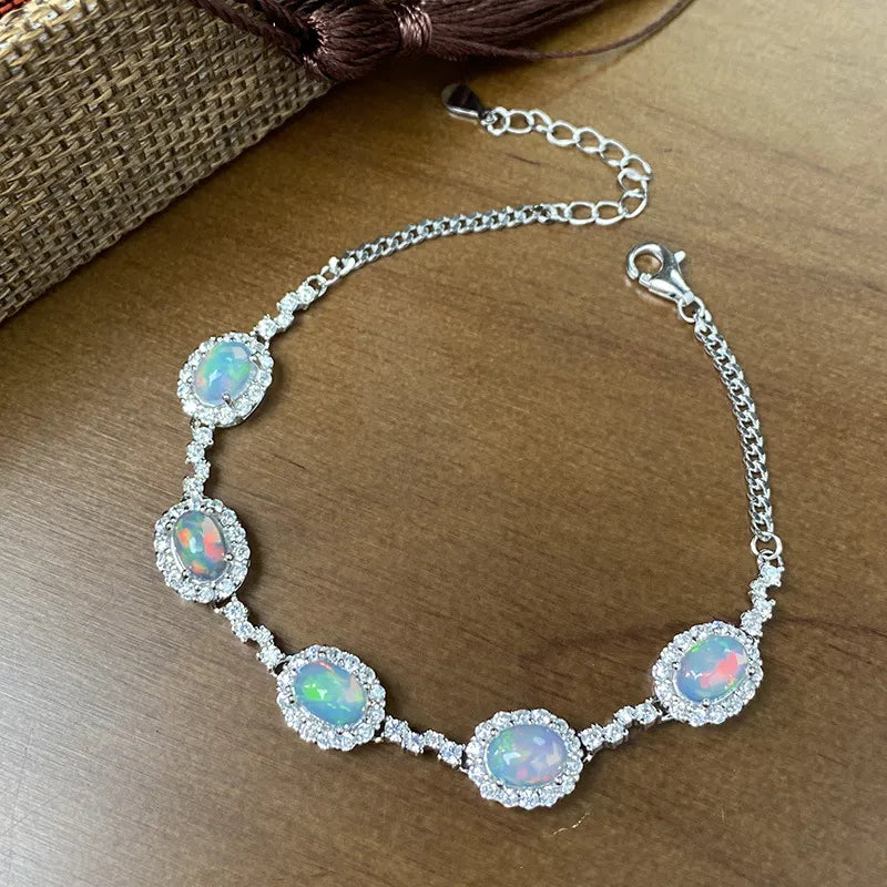 Opal Birthstone Bracelet in 925 Sterling Silver with Five Oval Opal Halo Links
