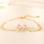 Pink Butterfly Bracelet in 925 Sterling Silver with Layered Cubic Zirconia Wings and Curved Side Accents