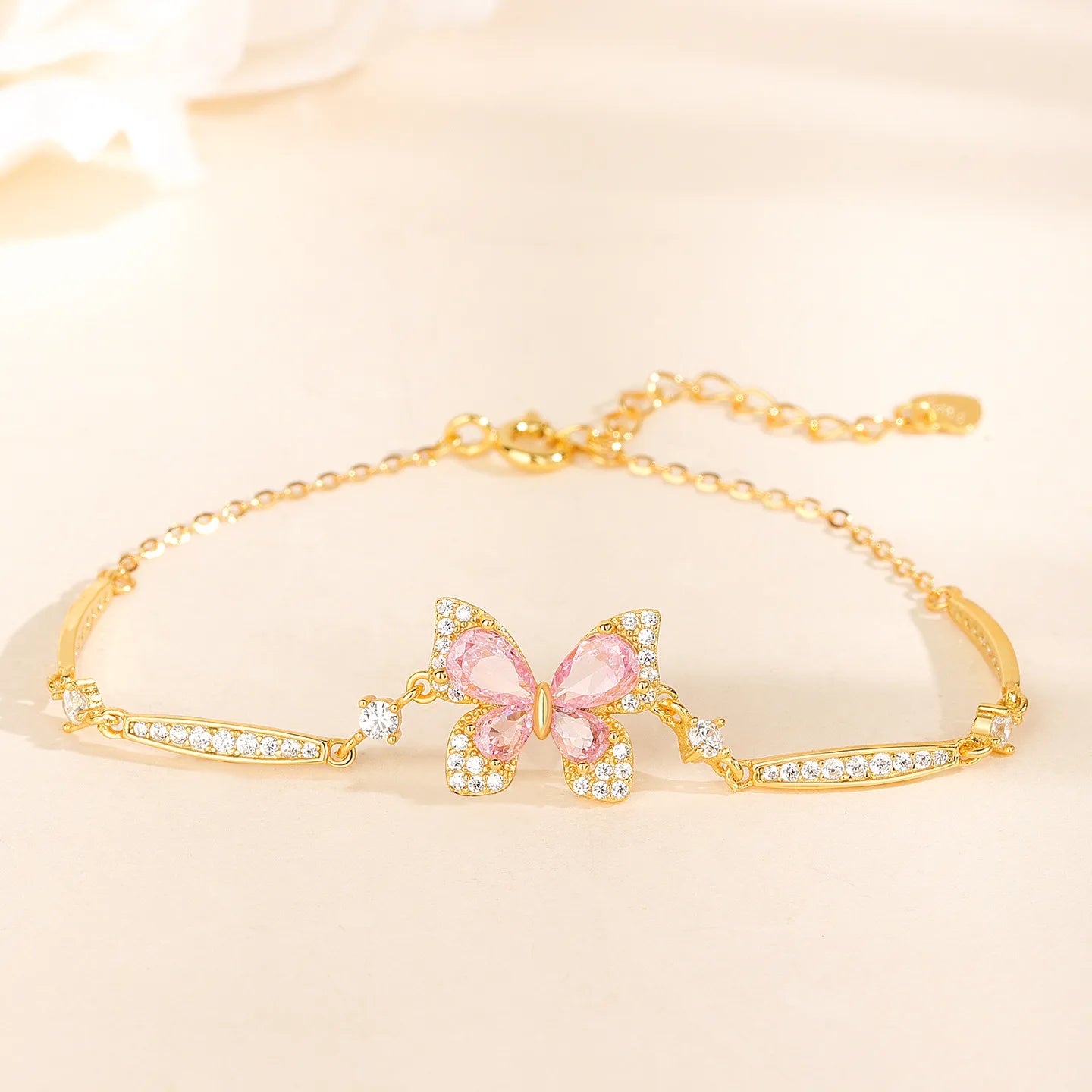 Pink Butterfly Bracelet in 925 Sterling Silver with Layered Cubic Zirconia Wings and Curved Side Accents