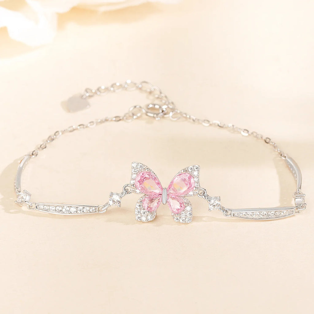 Pink Butterfly Bracelet in 925 Sterling Silver with Layered Cubic Zirconia Wings and Curved Side Accents