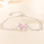 Pink Butterfly Bracelet in 925 Sterling Silver with Layered Cubic Zirconia Wings and Curved Side Accents