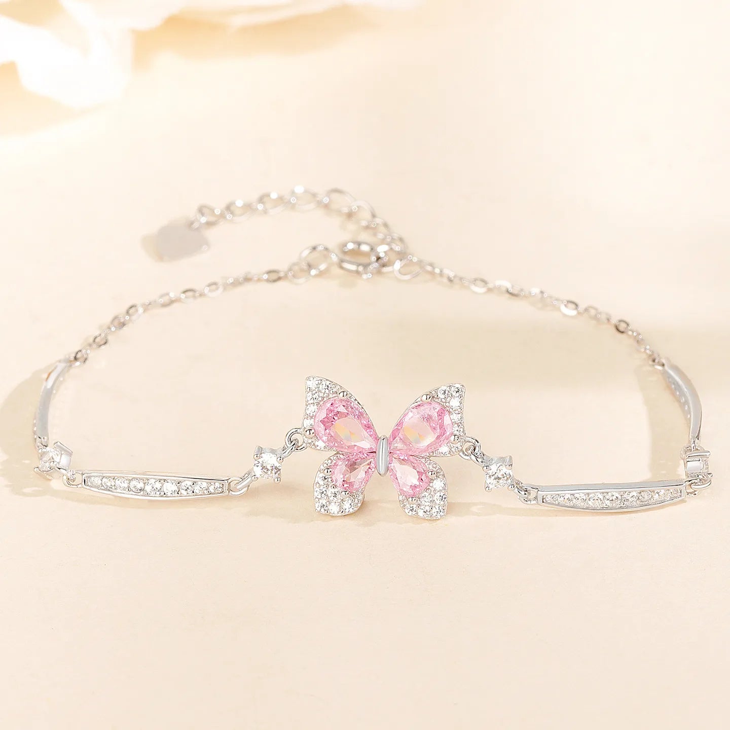 Pink Butterfly Bracelet in 925 Sterling Silver with Layered Cubic Zirconia Wings and Curved Side Accents