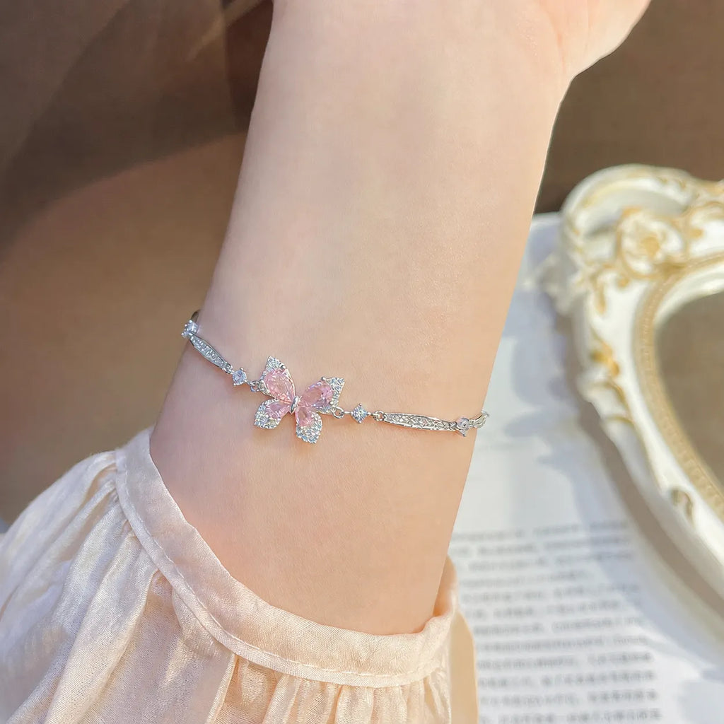 Pink Butterfly Bracelet in 925 Sterling Silver with Layered Cubic Zirconia Wings and Curved Side Accents