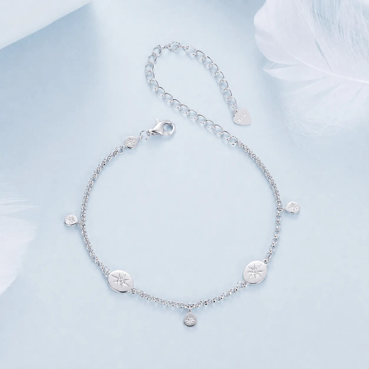 925 sterling silver bracelet with six sun motifs, each centered with clear cubic zirconia